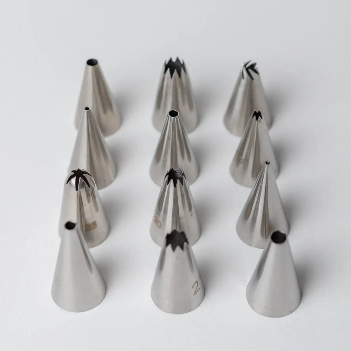 Boîte de 12 petites douilles Layer en inox
