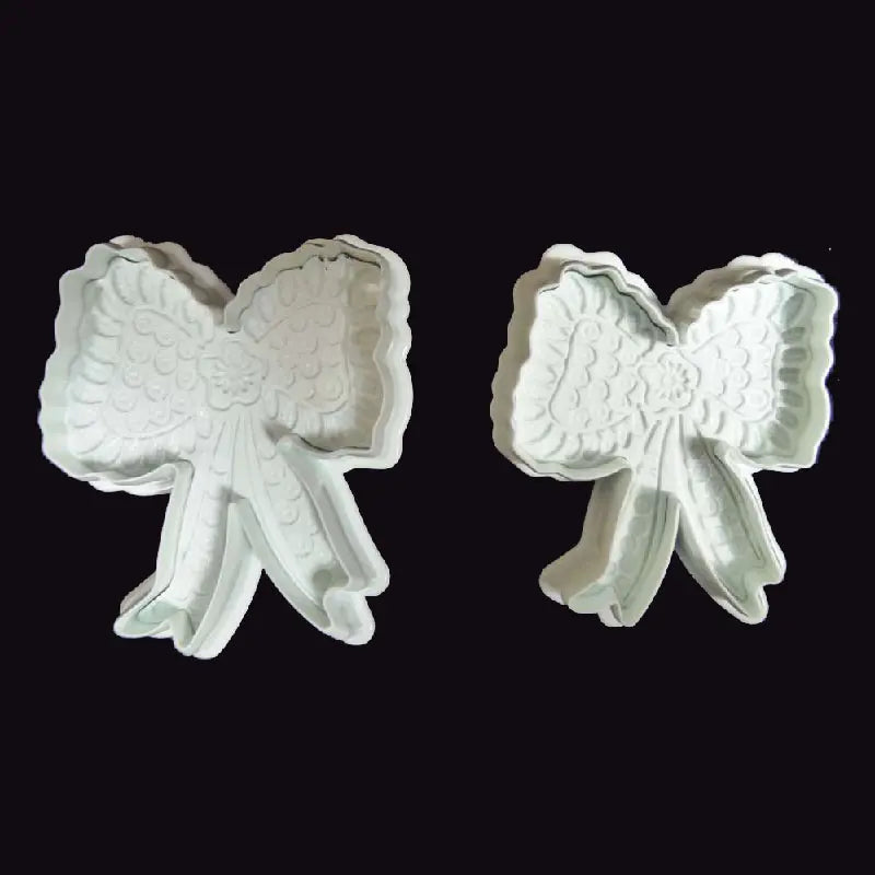Emporte-pièces piston nœud lot de 2